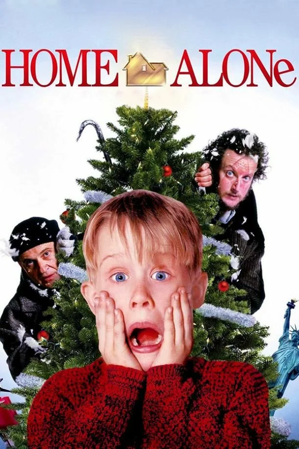 Home Alone poster with a surprised boy holding his cheeks in front of a Christmas tree.