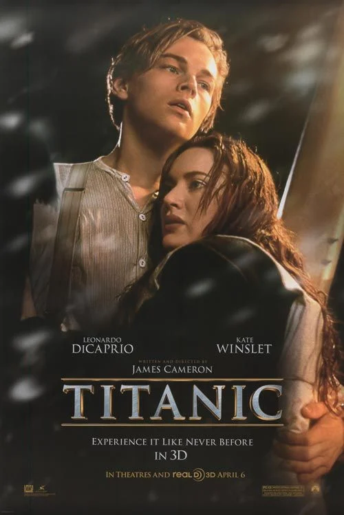 Titanic poster showing a couple embracing above a large ocean liner.